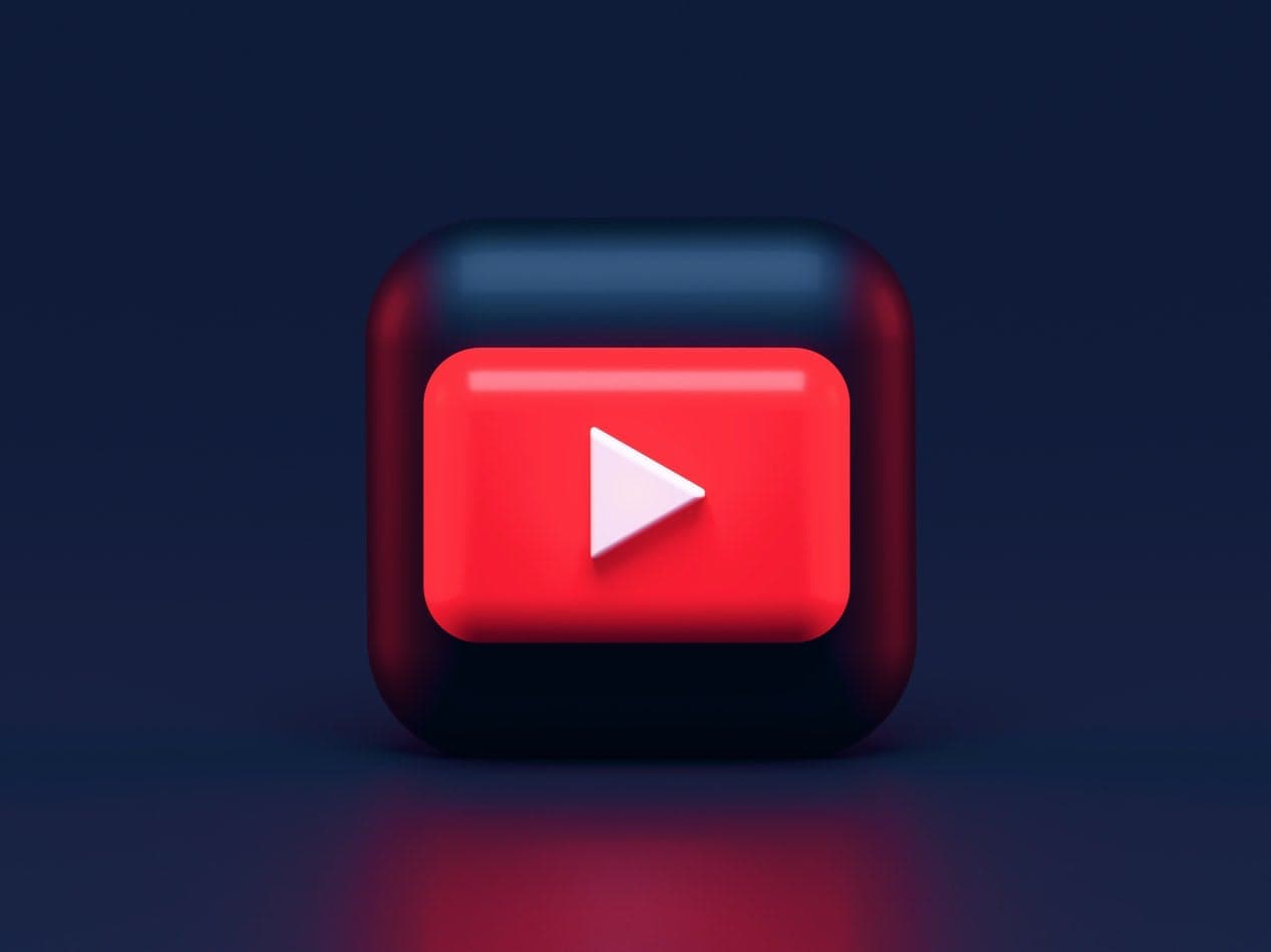 3D rendered YouTube play button. Photo by Alexander Shatov on Unsplash.